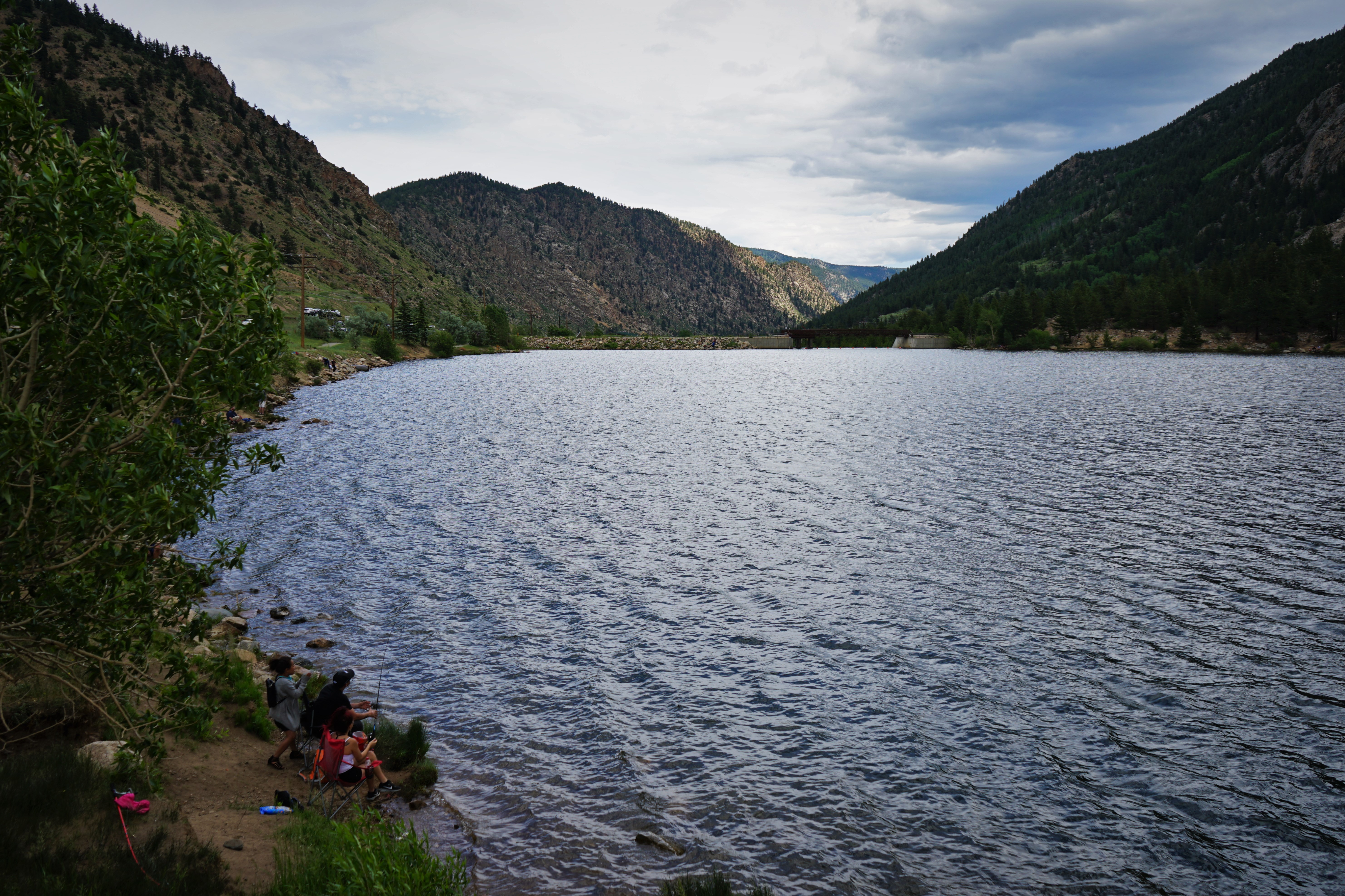 Lake with a family fishing