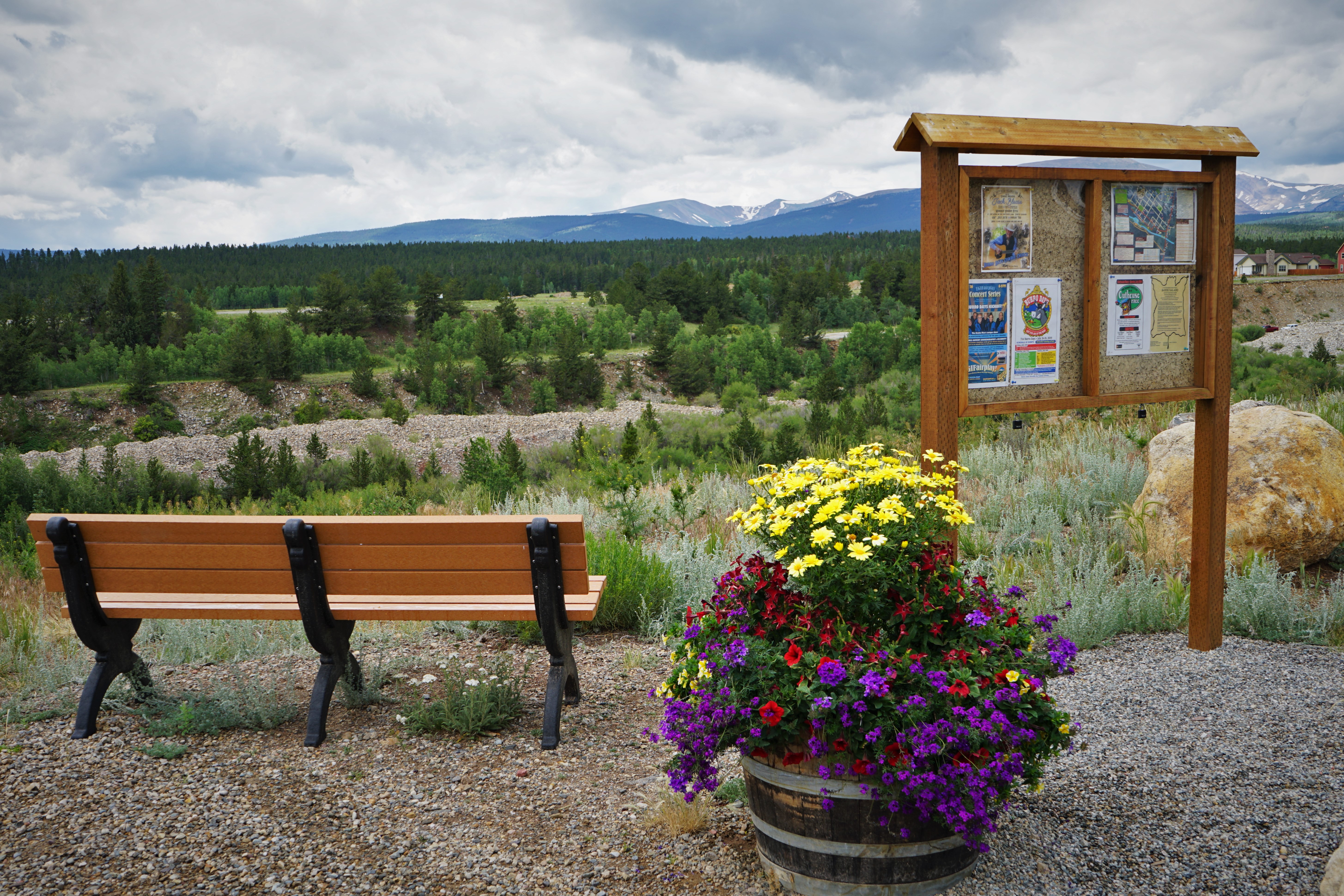 picnic bench and flower pot high in mountain area