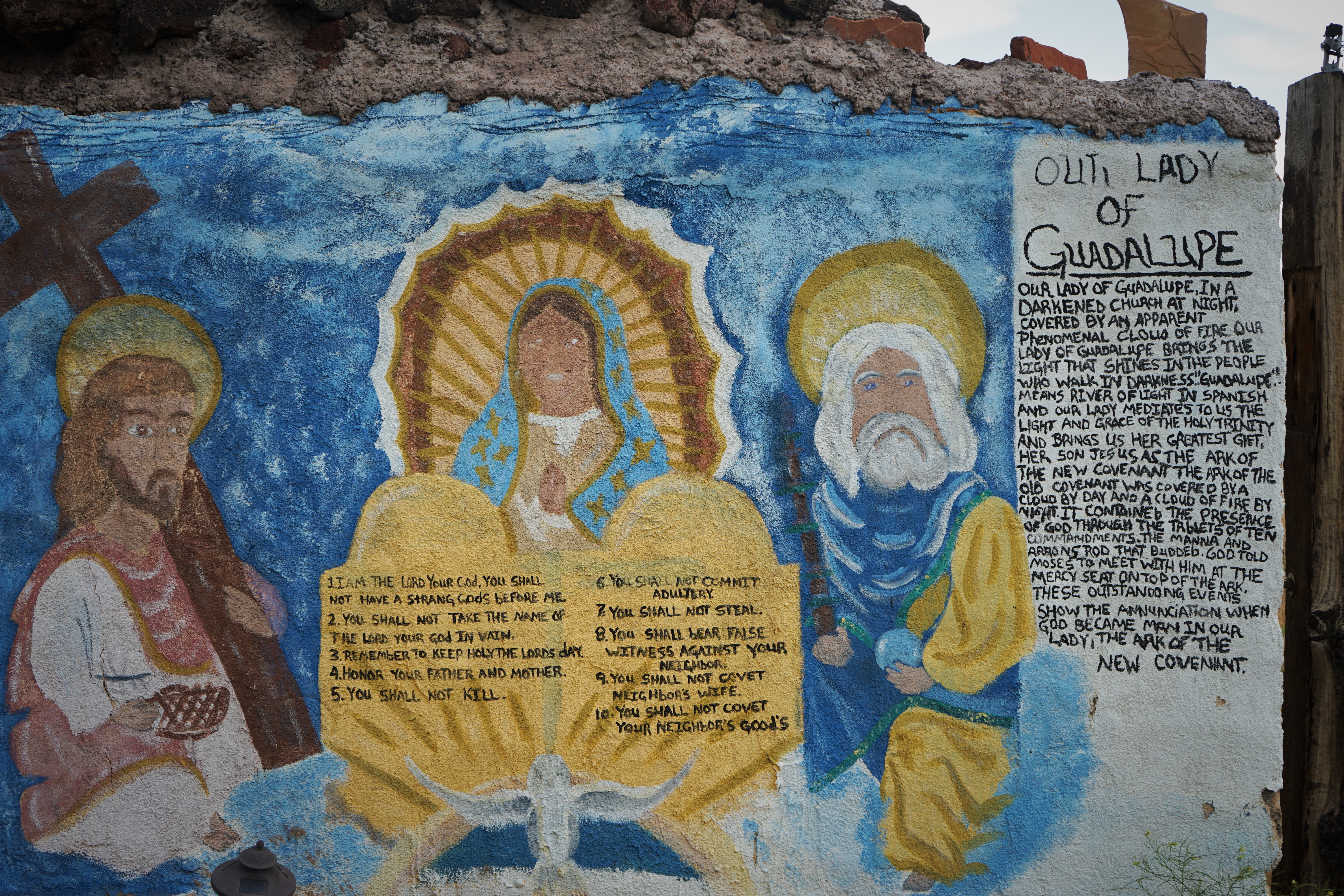 story of 'Our Lady of Guadalupe' painted on plaster wall