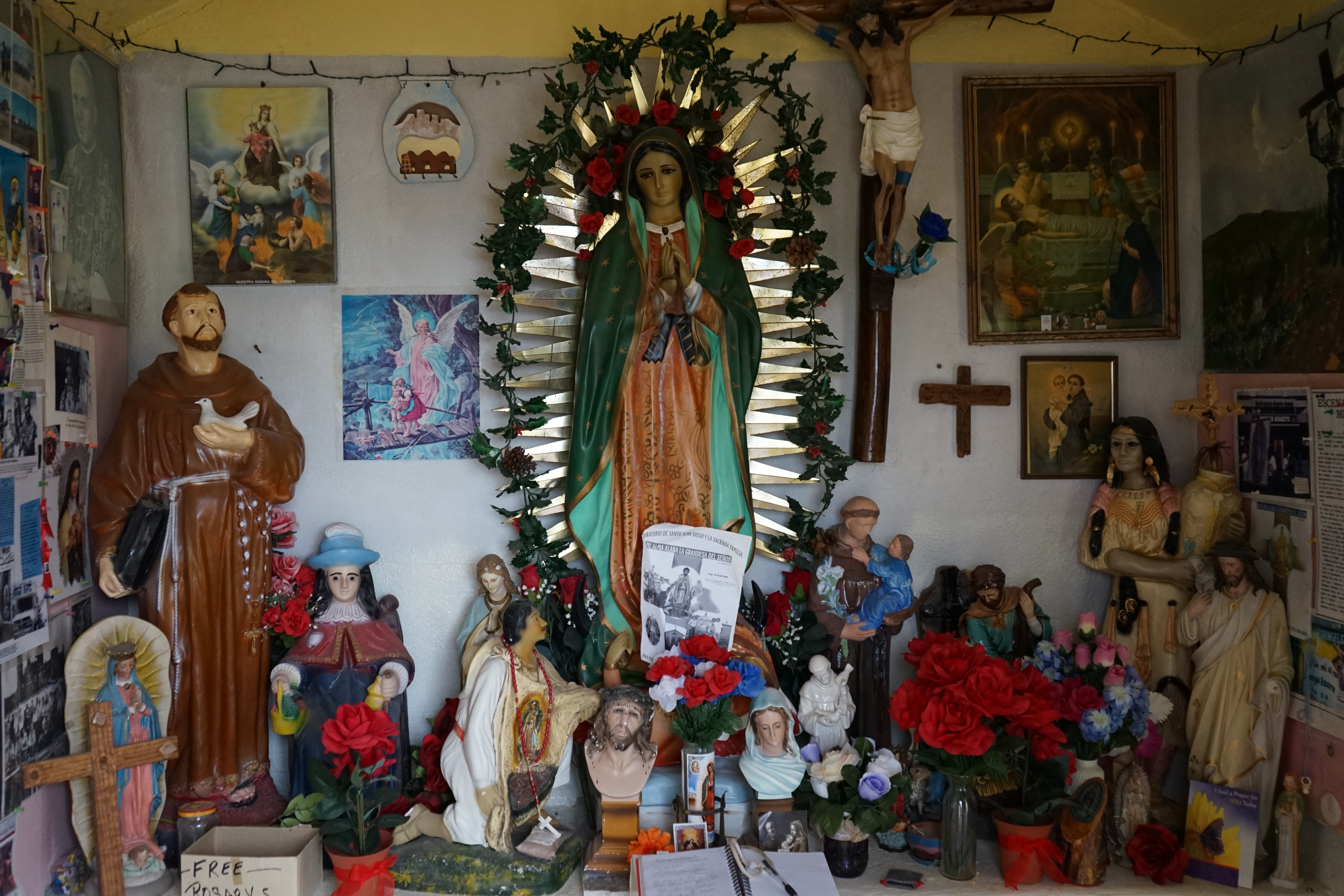relics and figurines in roadside chapel
