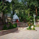 statue of Buddha on stone platform